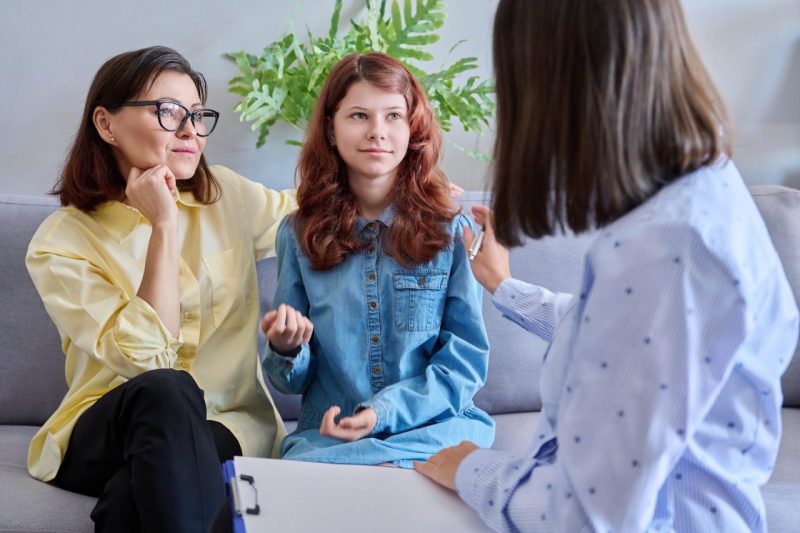 child-psychologist-session-mother-daughter-therapist-together-in-office.jpg